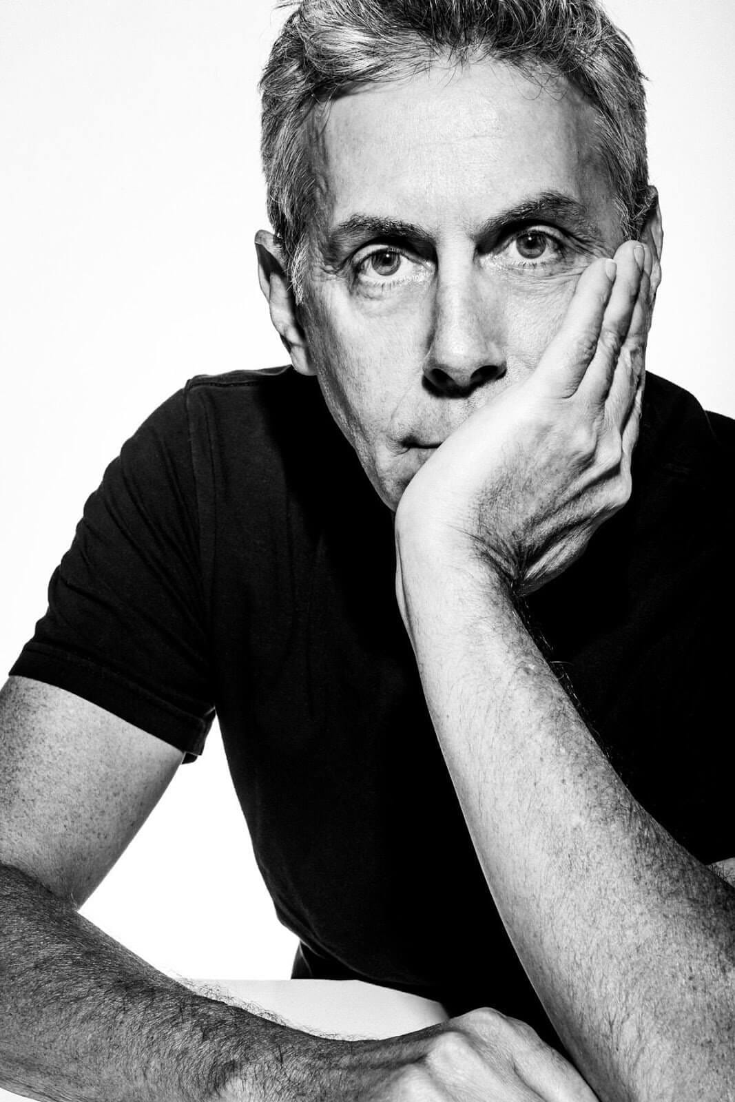 A black-and-white portrait of filmmaker Aaron Weisblatt