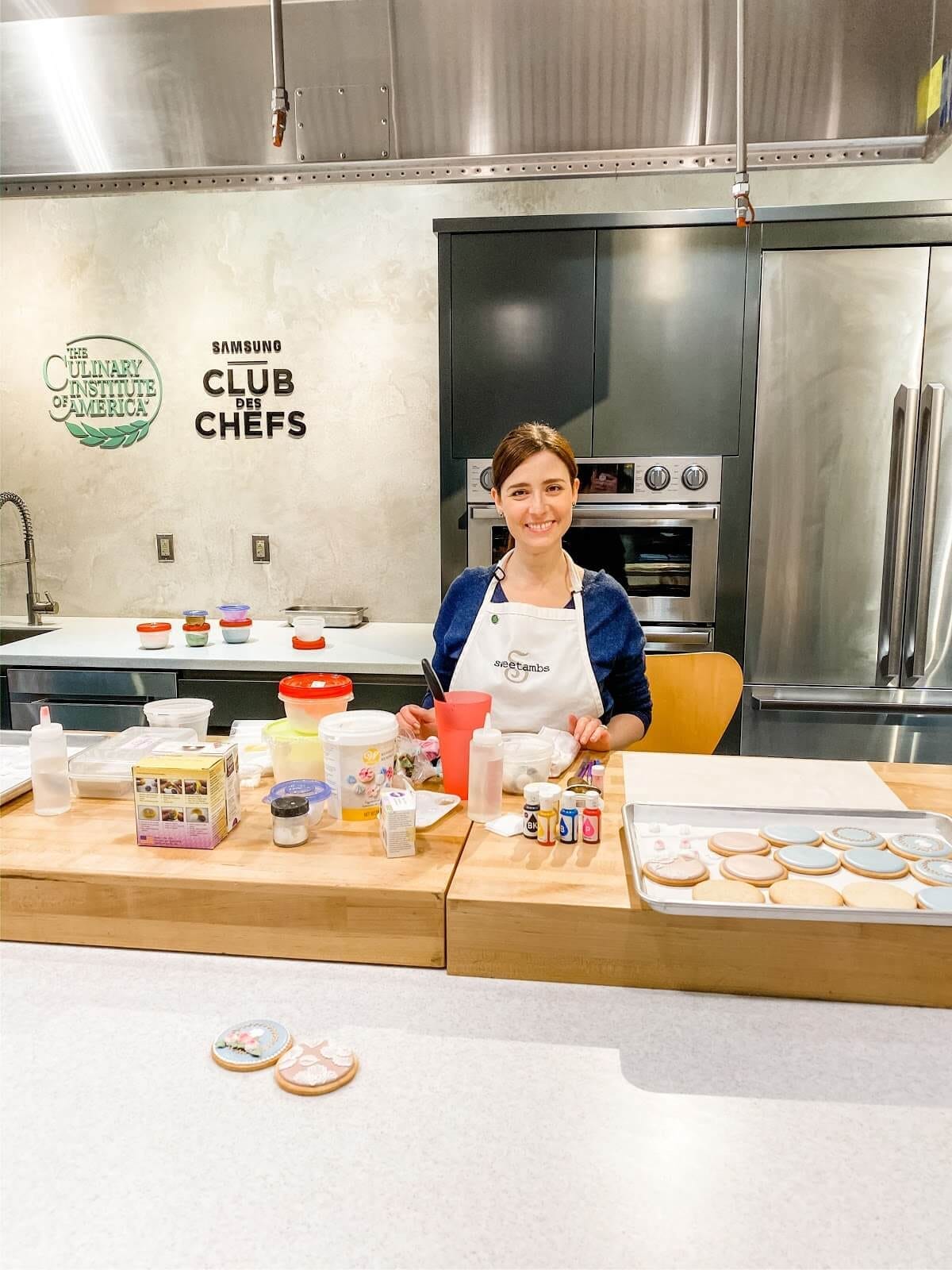 Cookie artist Amber Spiegel teaching a cookie decorating class at the Culinary Institute of America