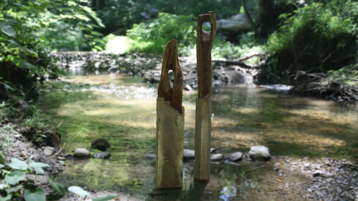 Two of Brad Teasdale's mermaid totem sculptures