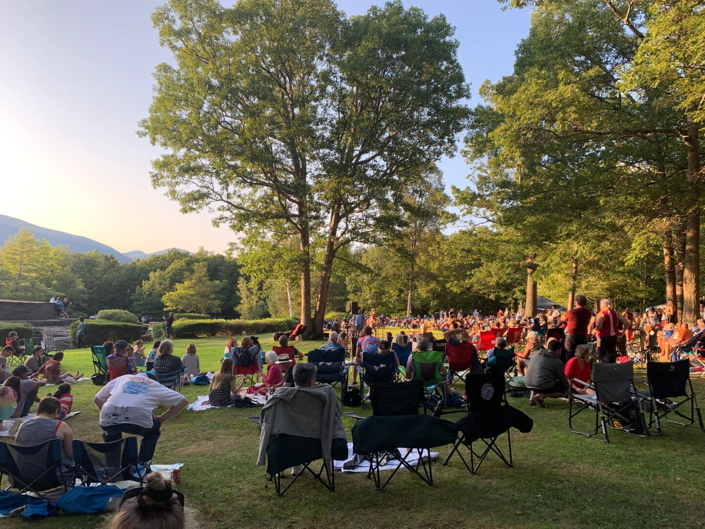 A large crowd watching a performance at Opus 40 in the Hudson Valley