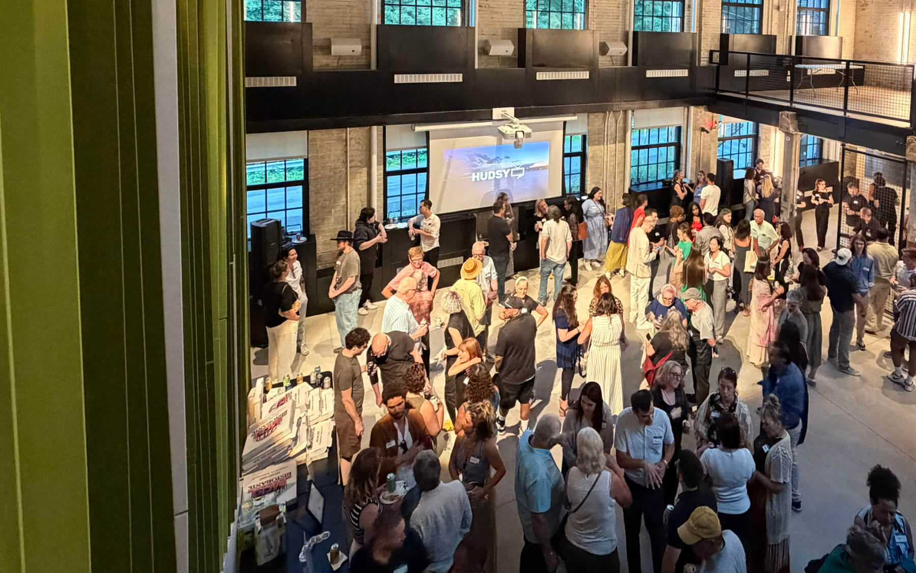 People mingling at the ConnectHV meetup at the Northside Hub in Poughkeepsie