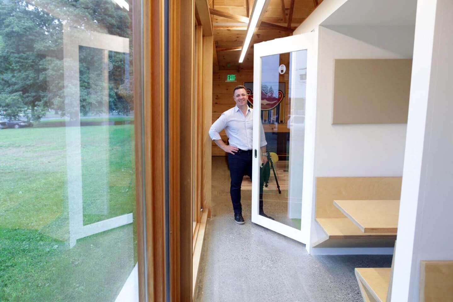 Hudson Valley-based entrepreneur Danny Potocki standing inside CO Coworking in Rhinebeck