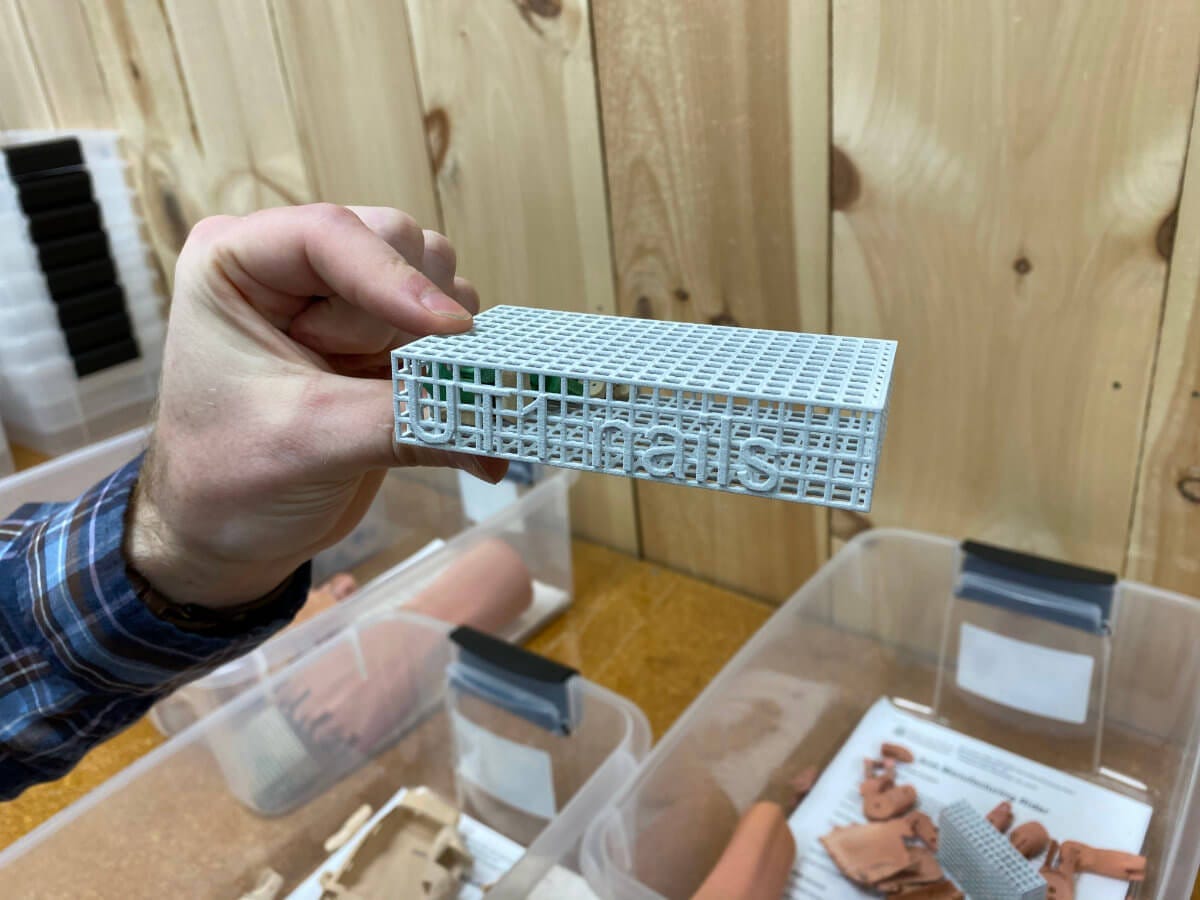 3D-printed disposable cages for small parts at the Unlimited Tomorrow offices in Rhinebeck NY
