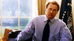 Jed Bartlet from The West Wing putting on his jacket