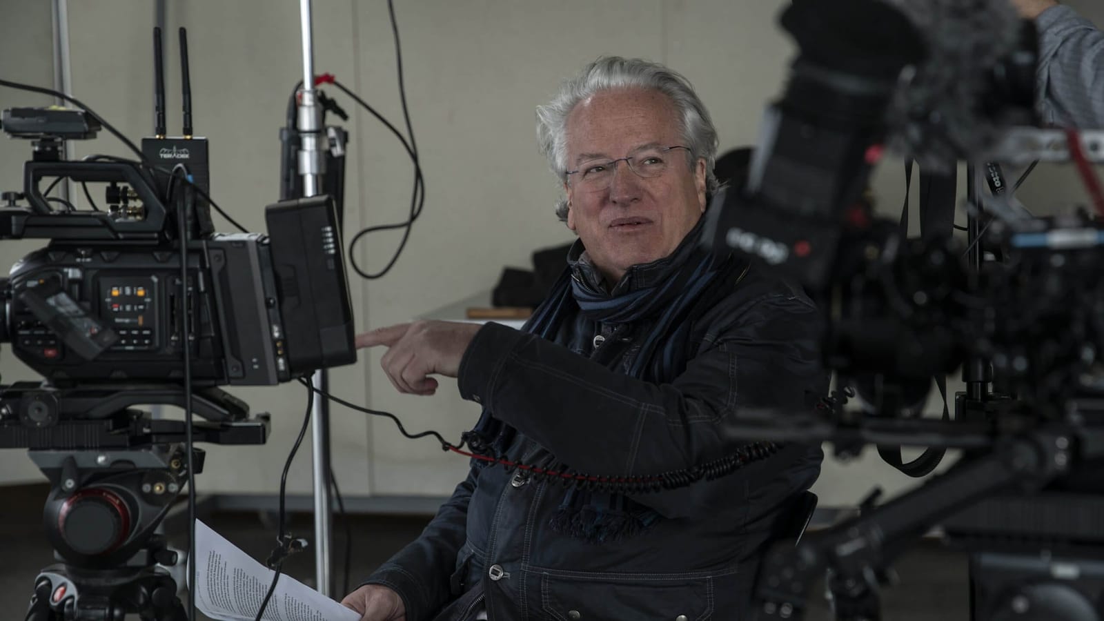 Filmmaker Jon Bowermster working behind a camera rig