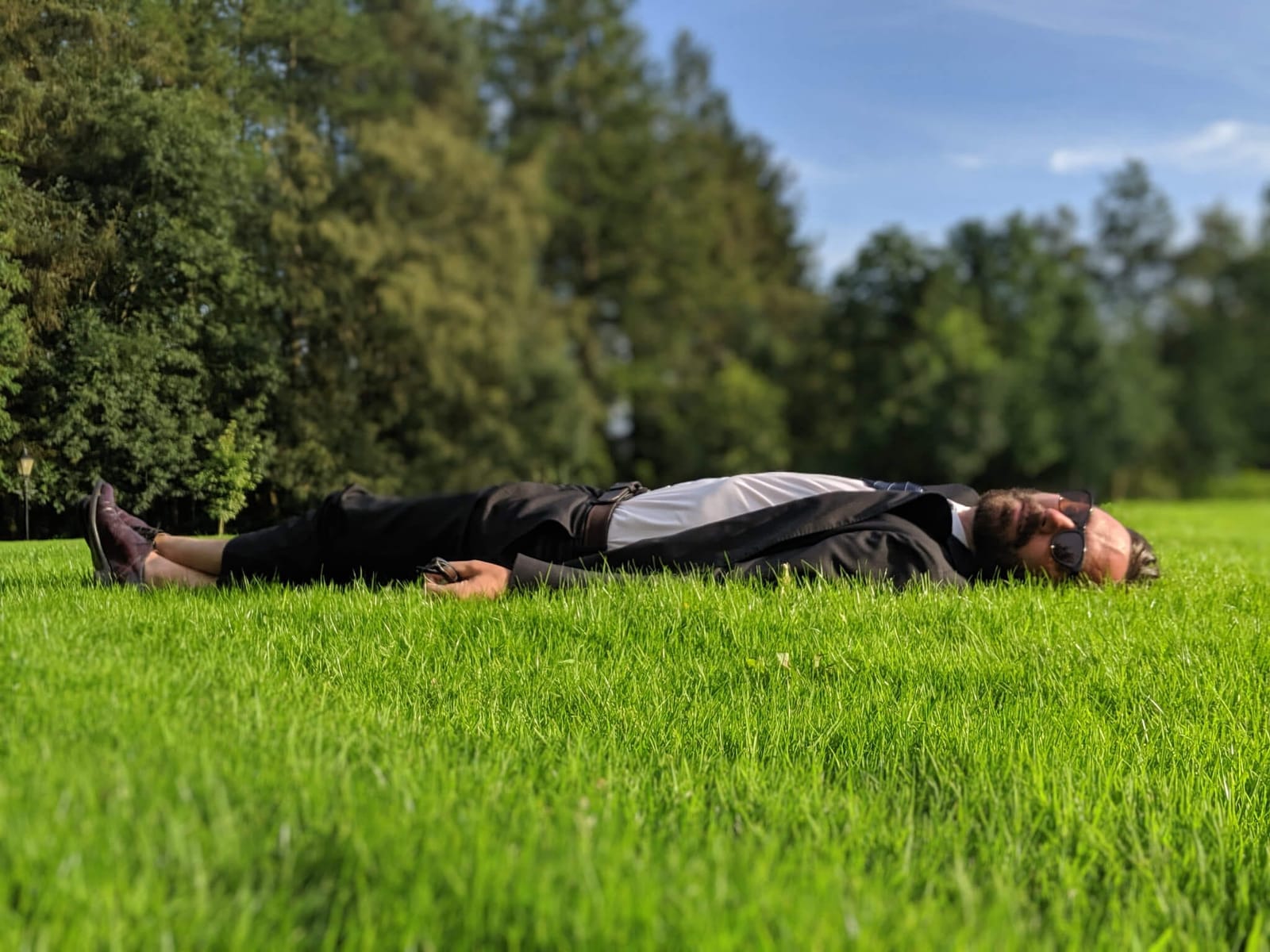 Hudson Valley-based musician Matt Pond lying in the grass