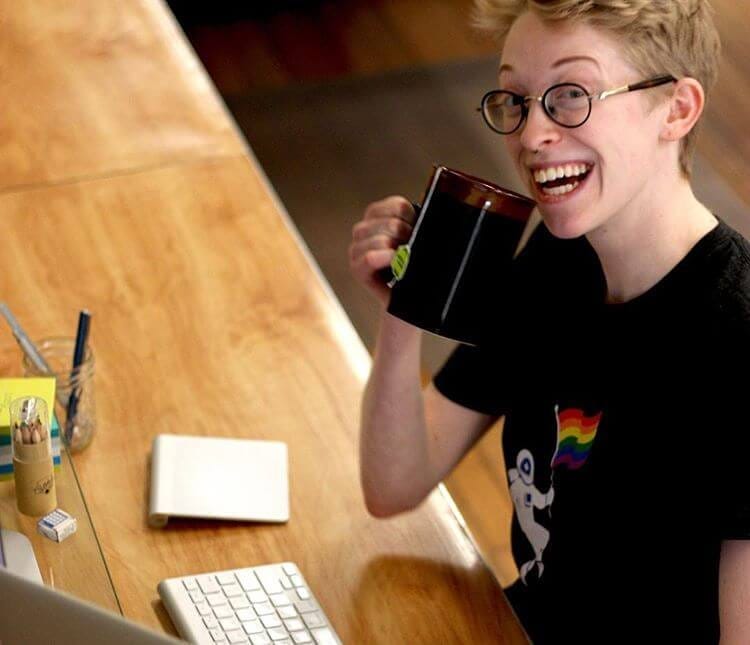 Designer Milo Axelrod at work with a cup of tea