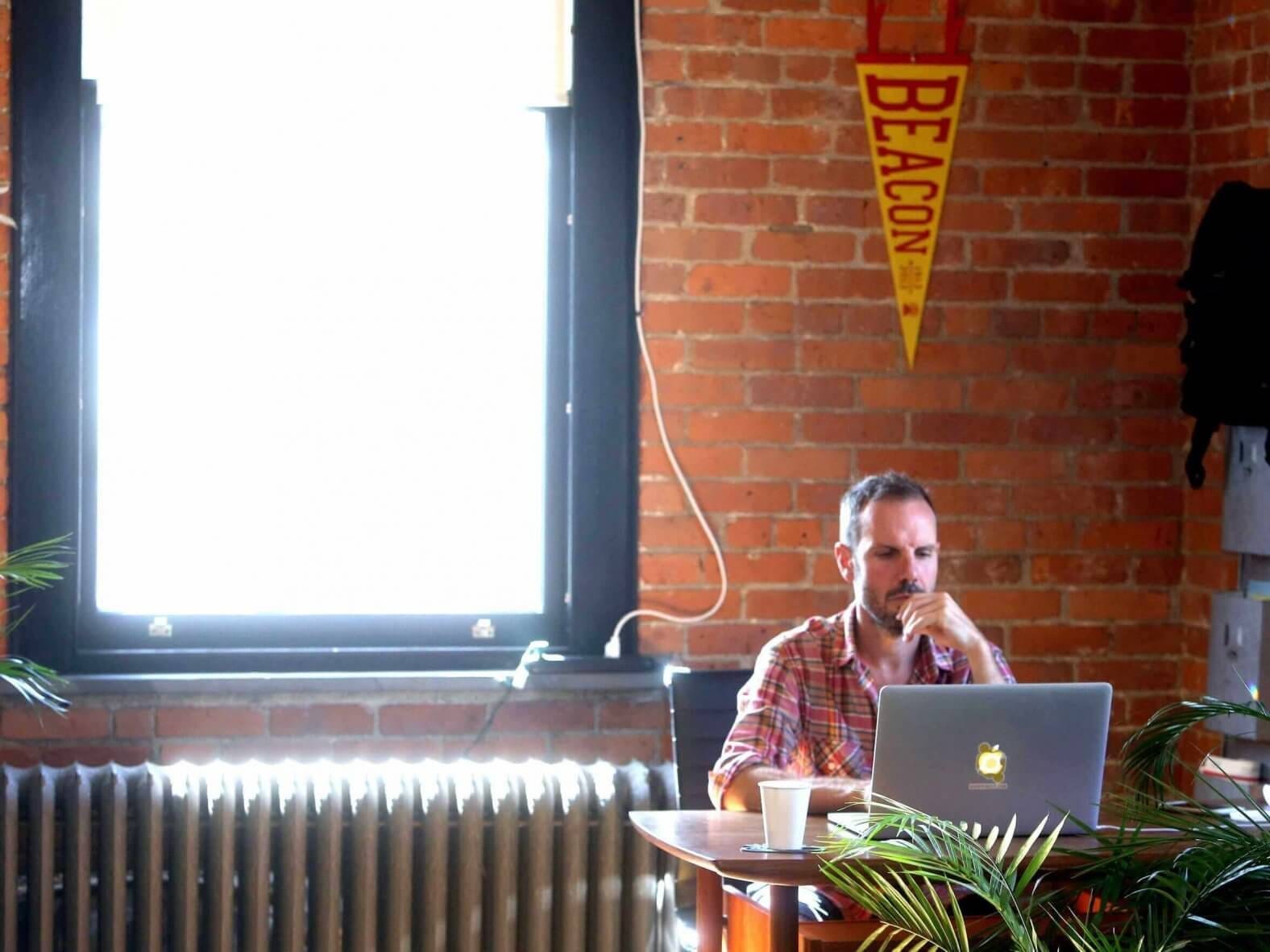 Scott Tillit working at BEAHIVE, the original Hudson Valley coworking space