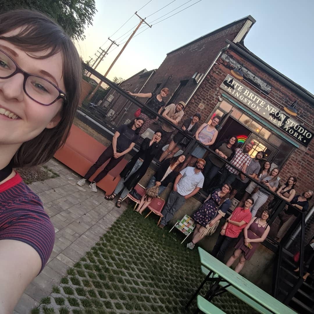 Shauna Keating and a group of local creatives who toured Lite Brite Neon as part of the “Connect with Creatives” she organized for AIGA Upstate.